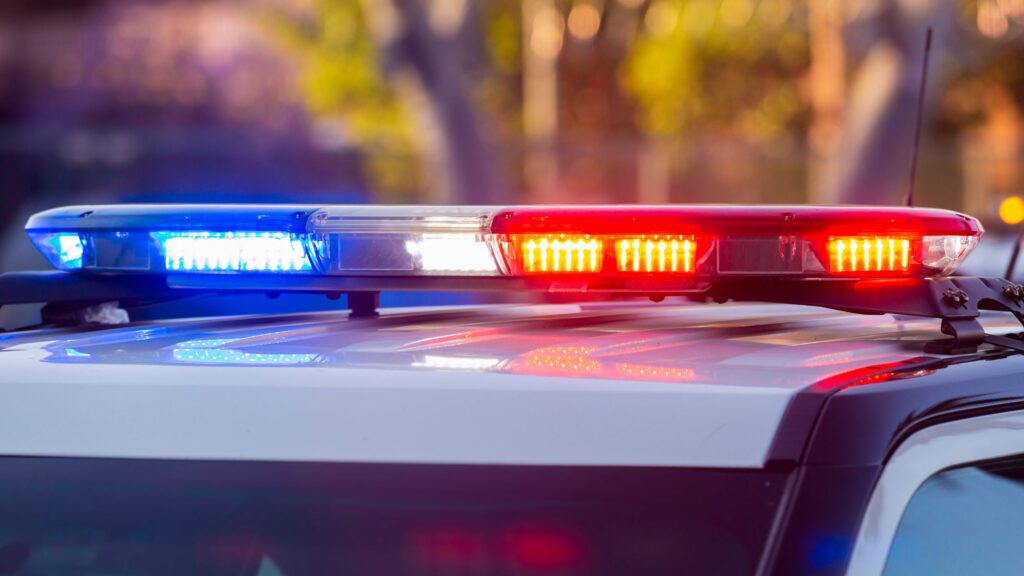 Closeup of police car lights on the roof of a police car